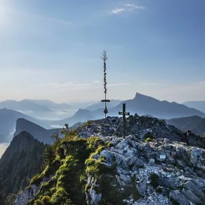 Drone shot, summit cross on the Schober with a view of the Schafberg