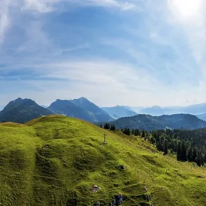 Drone shot, at the summit of the Taborberg with a view of the Osterhorn group and Dachstein massif Drone shot, at the summit of the Taborberg with a view of the Osterhorn group and Dachstein massif