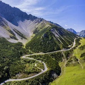 Drone shot, winding mountain road Drone shot, winding mountain road
