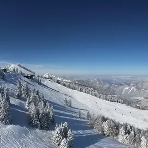 Drone shot, winter landscape with ski tracks in deep snow