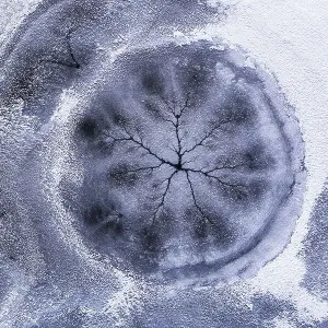Drone view. Abstract forms created on surface of freezing lake Drone view. Abstract forms created on surface of freezing lake