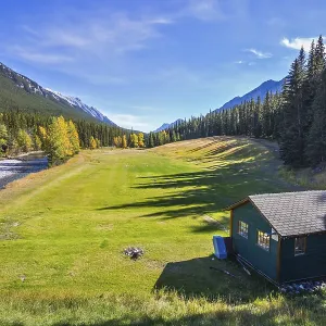 The drying-up stream among the woods and mountains of park Banff