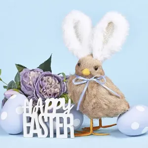 Easter chick with bunny ears, painted eggs and text Happy Easter on blue background Easter chick with bunny ears, painted eggs and text Happy Easter on blue background