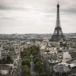 Eiffel Tower Print - Parisian Cityscape Under Overcast Sky