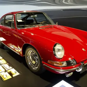 Elegant side view of a red Porsche classic car from 1966