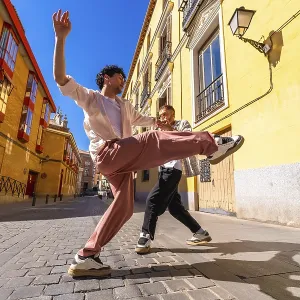 Dynamic Dance on Cobblestone Street Print