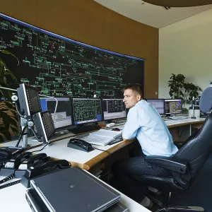 Engineer sitting at his work station in the Transmission Control Center