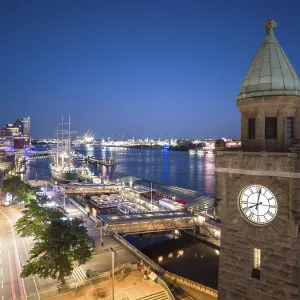 Evening atmosphere at the Landungsbrucken with a view of the Elbphilharmonie