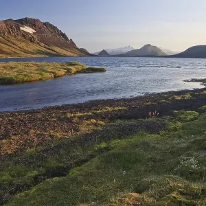 Evening on a lake in a volcanic landscape Evening on a lake in a volcanic landscape