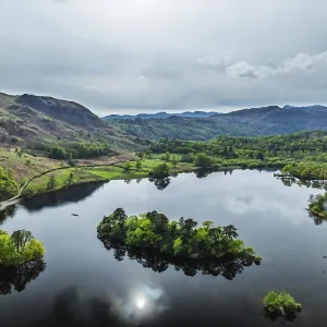 Farms and Mountains over road A591 from a drone