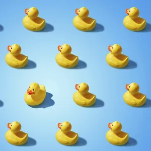 Fashion minimalistic concept of a yellow rubber duck pattern flat lay Fashion minimalistic concept of a yellow rubber duck pattern flat lay