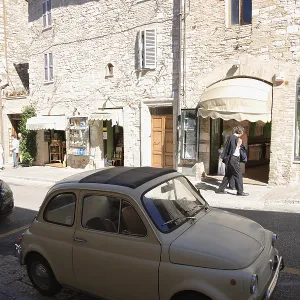 Fiat 500 in a street in the historic centre of Assisi