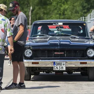 FINOWFURT, GERMANY - JUNE 28, 2024: A compact car Chevrolet Chevy II / Nova on the starting line FINOWFURT, GERMANY - JUNE 28, 2024: A compact car Chevrolet Chevy II / Nova on the starting line