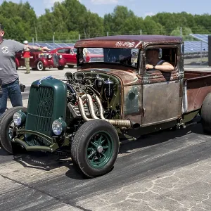 FINOWFURT, GERMANY - JUNE 28, 2024: The custom hot rod (pickup truck) on the racing line FINOWFURT, GERMANY - JUNE 28, 2024: The custom hot rod (pickup truck) on the racing line