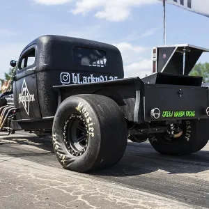 FINOWFURT, GERMANY - JUNE 28, 2024: The custom hot rod (poickup truck) on the racing line FINOWFURT, GERMANY - JUNE 28, 2024: The custom hot rod (poickup truck) on the racing line