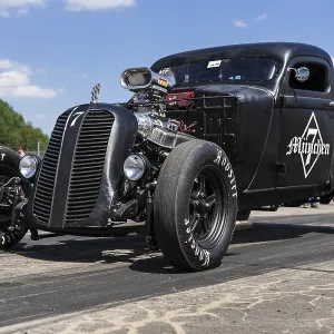 FINOWFURT, GERMANY - JUNE 28, 2024: The custom hot rod (poickup truck) on the racing line FINOWFURT, GERMANY - JUNE 28, 2024: The custom hot rod (poickup truck) on the racing line