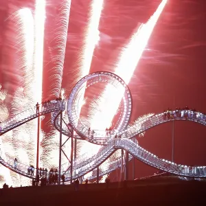 Fireworks display during opening of the walkable landmark sculpture in the shape of a roller coaster