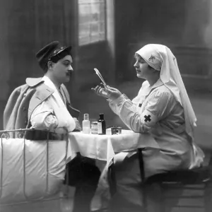 First World War, wounded French soldier with nurse First World War, wounded French soldier with nurse