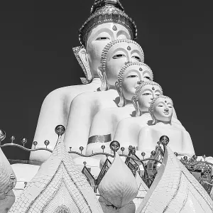 Five-headed Buddha statue, black and white photo Five-headed Buddha statue, black and white photo