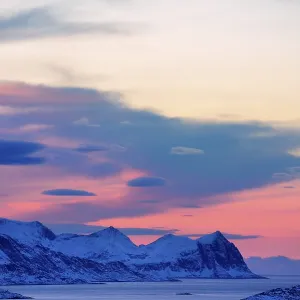 Fjord with mountains in winter at sunset Fjord with mountains in winter at sunset