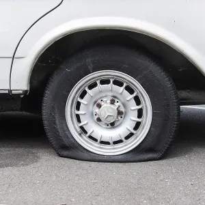 A flat tyre on a car, Wuppertal, Germany A flat tyre on a car, Wuppertal, Germany
