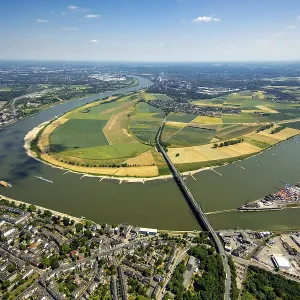 Flood prevention, Rhine dike at Mundelheim with Uerdingen opposite and BundesstraBe 288 bridge Flood prevention, Rhine dike at Mundelheim with Uerdingen opposite and BundesstraBe 288 bridge