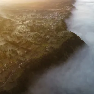 Fog lying between the mountains at sunrise Fog lying between the mountains at sunrise