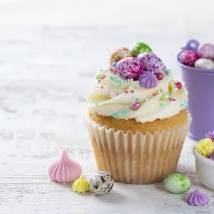 Food, Beautiful festive Easter cupcakes decorated with colorful sprinkles end candy eggs Food, Beautiful festive Easter cupcakes decorated with colorful sprinkles end candy eggs