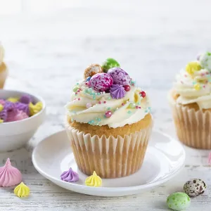 Food, Easter cupcakes decorated with colorful sprinkles end candy eggs Food, Easter cupcakes decorated with colorful sprinkles end candy eggs