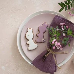 Food, Easter table setting with flowers and bunny icing cookies Food, Easter table setting with flowers and bunny icing cookies