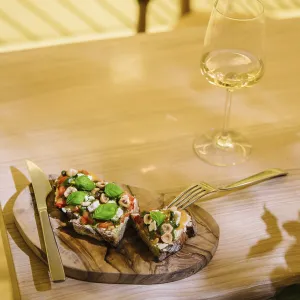 Food, Glass of wine and bruschetta with pesto sauce Food, Glass of wine and bruschetta with pesto sauce