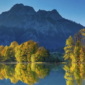 Forggensee in autumn, behind it the Saeuling Forggensee in autumn, behind it the Saeuling