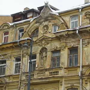Fragment of the facade of an eclectic-style apartment building in the city center