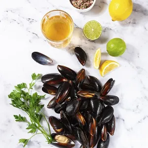 Fresh mussels scattered on the table
