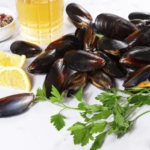 Fresh mussels scattered on the table