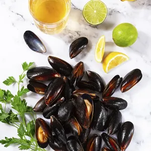 Fresh mussels scattered on the table