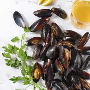 Fresh mussels scattered on the table