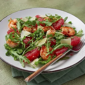Fresh shrimp salad with arugula