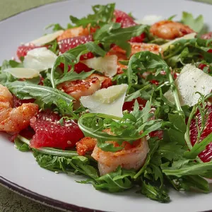 Fresh shrimp salad with arugula