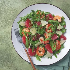 Fresh shrimp salad with arugula