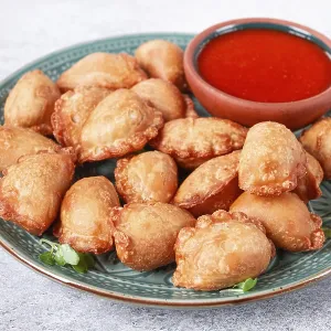 Fried Mini Chebureks Print with Sauce Fried Mini Chebureks Print with Sauce