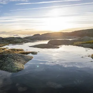 Frozen Lake in Serra da Estrela Mountains at Sunrise