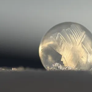 Frozen soap bubble in the snow, Herten, Germany Frozen soap bubble in the snow, Herten, Germany