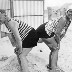 Funny couple at the beach, historic photograph Funny couple at the beach, historic photograph