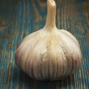 Garlic bulb on wooden background Garlic bulb on wooden background
