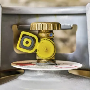 Gas tank valve with yellow cap and replacement gasket Gas tank valve with yellow cap and replacement gasket
