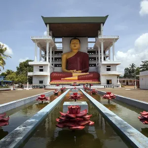 Giant Buddha statue, sitting Buddha fountain with artificial lotuses