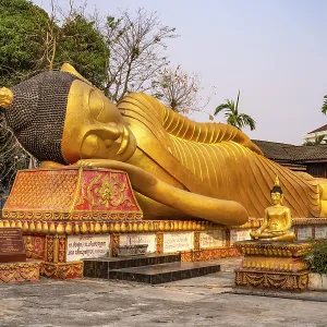 Giant reclining Buddha at Wat That Khao temple in the capital Vientiane Giant reclining Buddha at Wat That Khao temple in the capital Vientiane