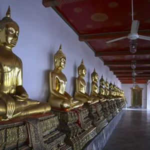 Gilded Buddha statues in Wat Pho Gilded Buddha statues in Wat Pho
