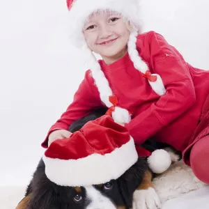 Girl and Dog with Christmas Hats Print Girl and Dog with Christmas Hats Print